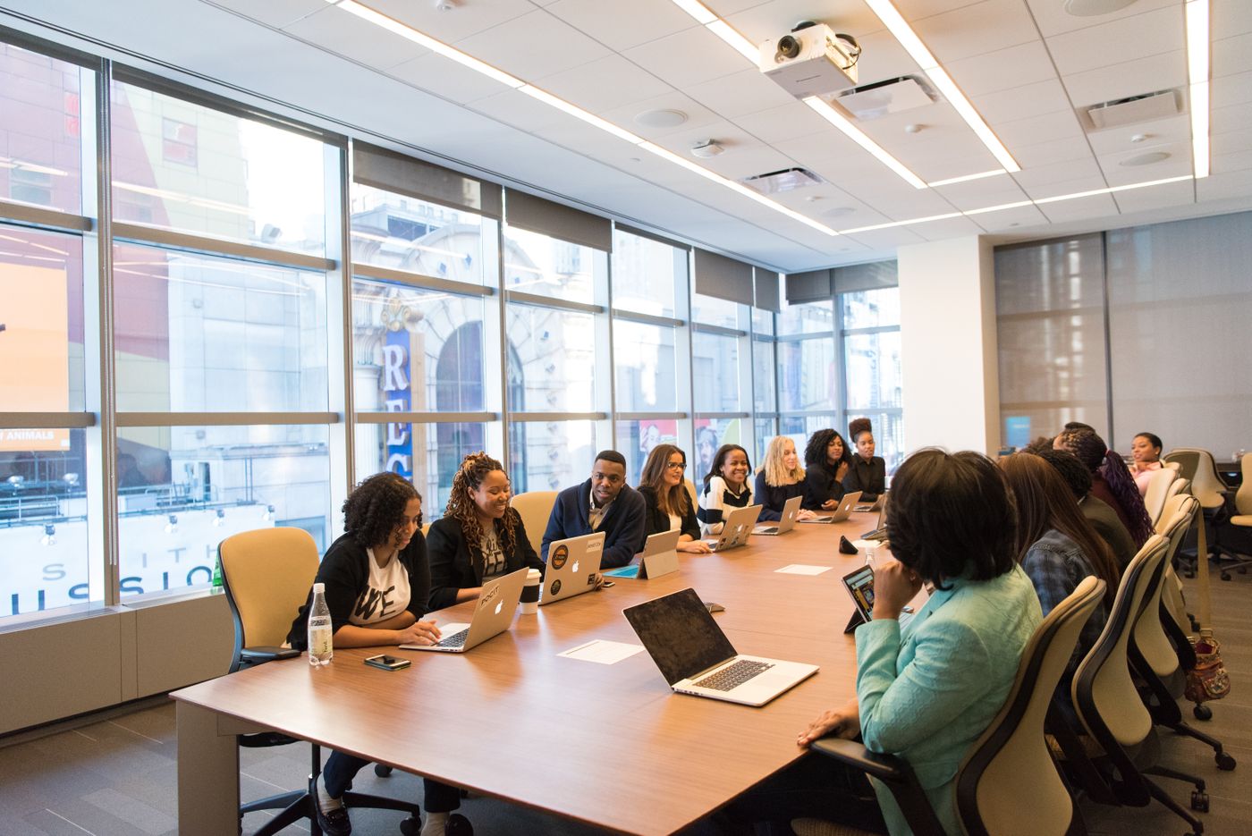 Board meeting around a long conference table