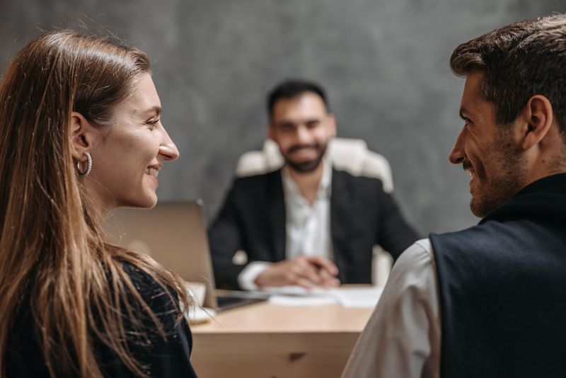 Advisers in discussion with a client
